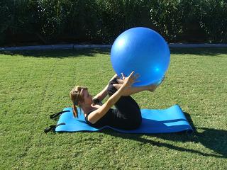 rolling with exercise ball image