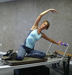 pilates side bending exercise image