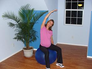 pregnant exercise ball stretch image