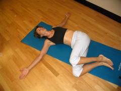 pilates knee sway exercise image