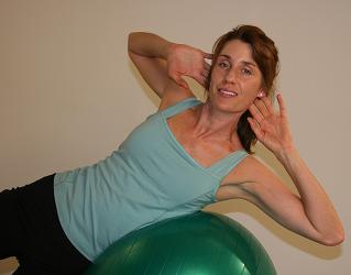 pilates ball side oblique exercise image