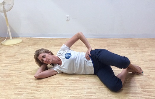 pilates side kick clam shell image