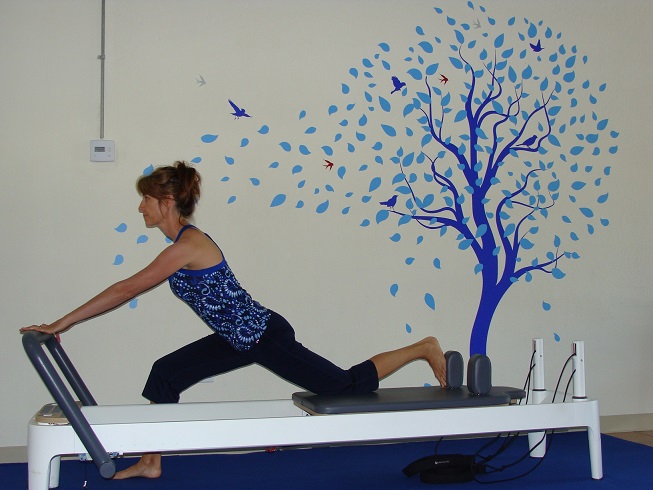 Pilates reformer exercise lunge image