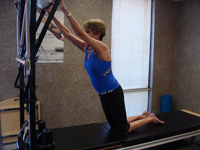 pilates cadillac exercise image