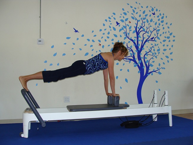 Pilates reformer workout image